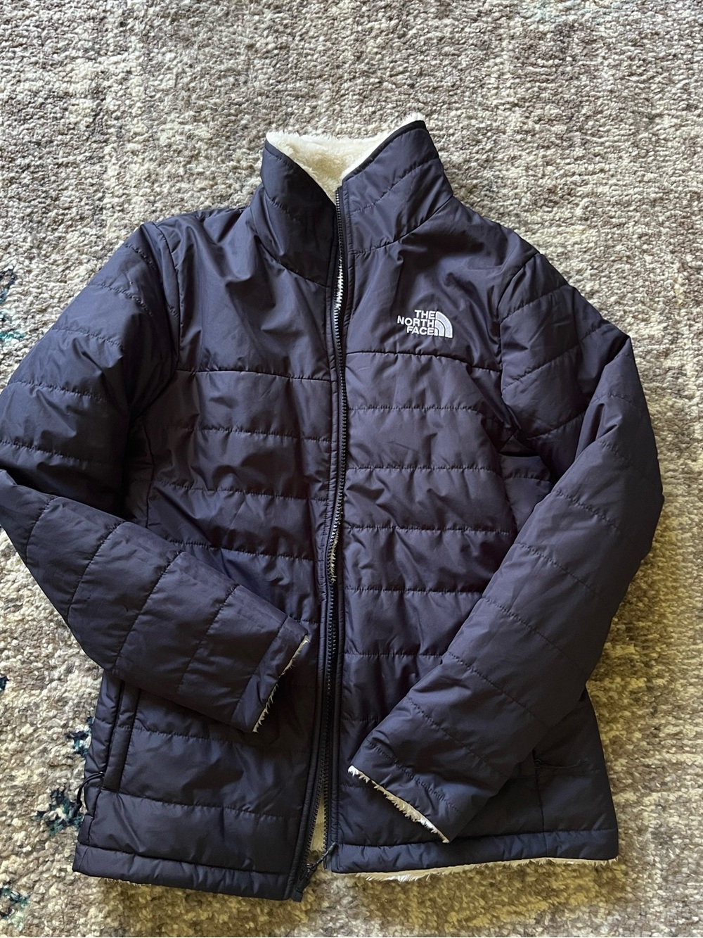 Navy and white fleece reversible North Face jacket, S